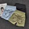 SHORT CON BOLSAS
